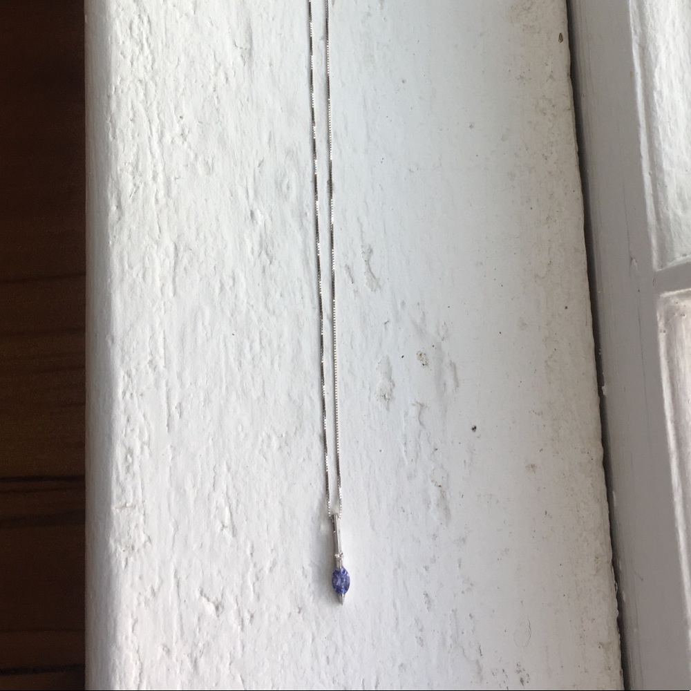 14k white gold tanzanite necklace. 18 inches